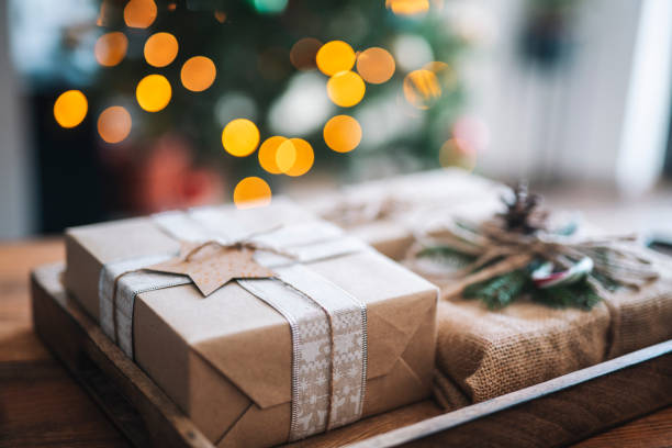 istock Rustic style Christmas presents in cozy home. 1432736429