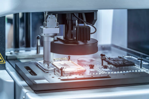 The multi-axis CMM machine measure the aluminum mobile phone part .