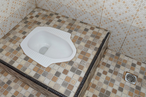 New white ceramic toilet isolated on a white background. Ceramic toilet bowl isolated