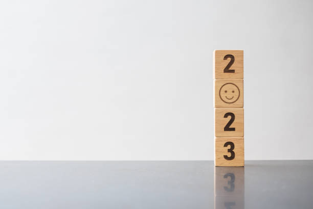 istock Smile face block with 2023 text.  Satisfaction, feedback, Review and New Year concepts 1432758642