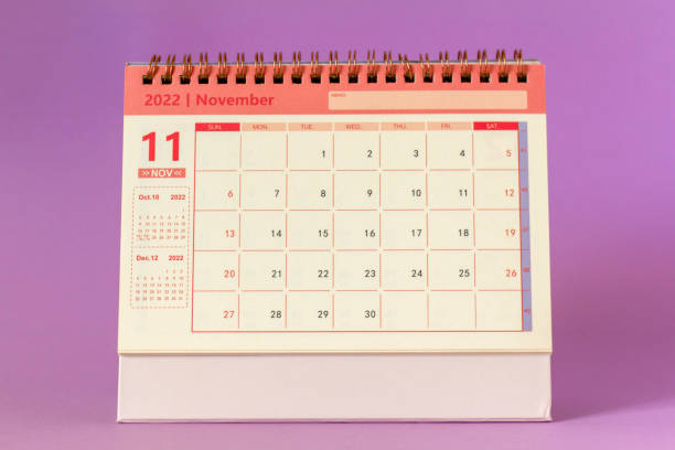 istock Desktop monthly calendar for November 2022 on a lilac background. 1432759336