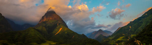 istock Banner Beautiful landscape mountain green field grass meadow white cloud blue sky on sunny day. panoramic Majestic green scenery big mountain hill cloudscape valley panorama view greenery countryside 1432762404