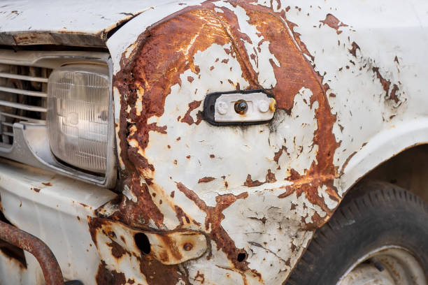 istock Ancient car abandoned in the countryside and illuminated with lanterns 1432762593