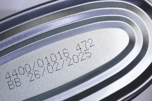 Closeup image of best before date on canned food