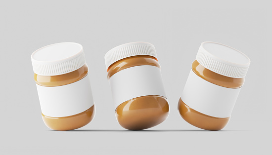 3d illustration. Mockup of two peanut butter jars with a white label and a screw cap on a gray background with a shadow. 3d render