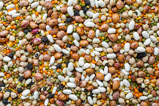 Beans assortment on white stone table