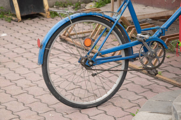 istock old blue bicycle stands in the yard close-up, bicycle 1432770904