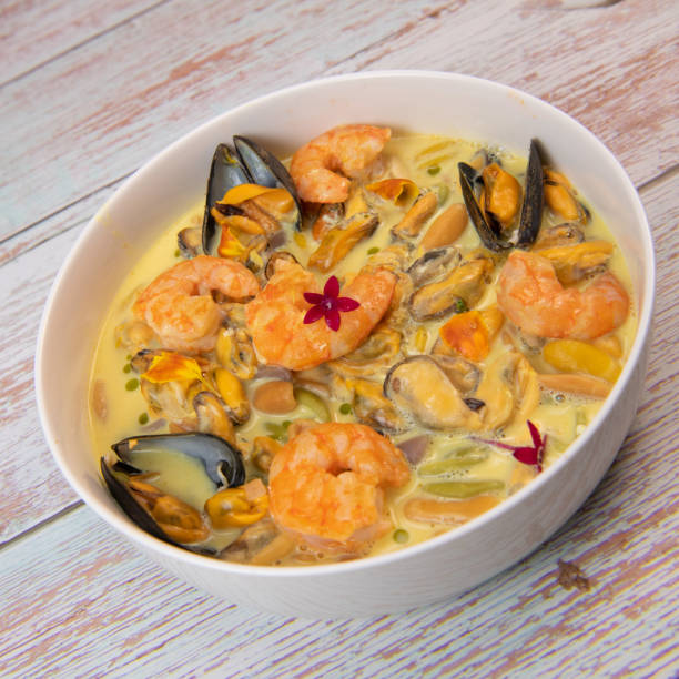 istock Recipe for marinated mussels with fresh cream, saffron curry and prawns 1432777985