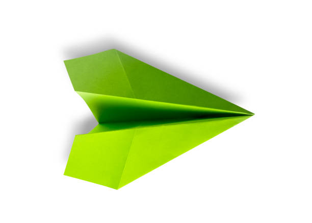 istock Green paper plane origami isolated on a white background 1432781739