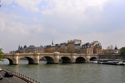 Paris, France- April 10, 2010: Paris is the center of French economy, politics and cultures and the top travel destinations in the globe.  It attracts the tourists all over the world.  Here is the Seine River.