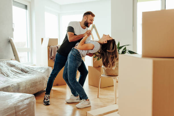 istock Couple dancing in apartment. 1432785124