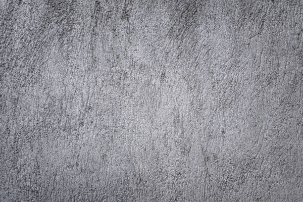 istock Gray grungy faded stucco, concrete and cement pattern, Textured Background. 1432786201