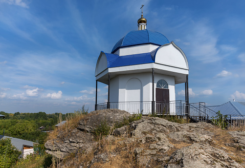 Chapel on the site of a watch tower in the ancient Ural city of Krasnoufimsk (Russia). The tower on the rock, which the locals call  \