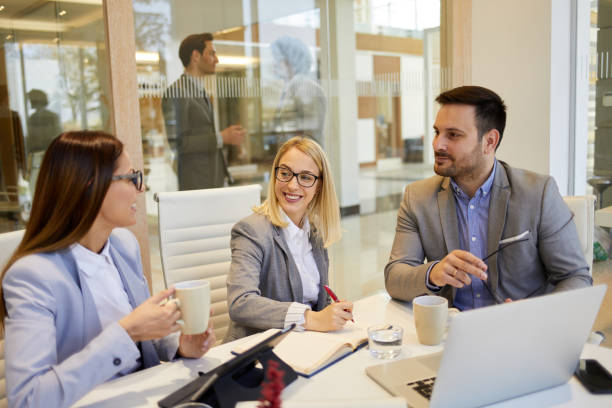 istock Business team brainstorming and discussing project in meeting room 1432786990
