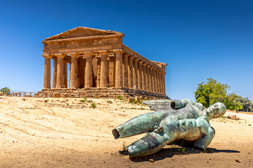 Agrigento, Sicily, Italy - July 12, 2020: Valley of Temples, Agrigento Sicily in Italy. Icarus bronze statue