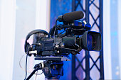 broadcast video camera to show what is happening on stage on large screens.