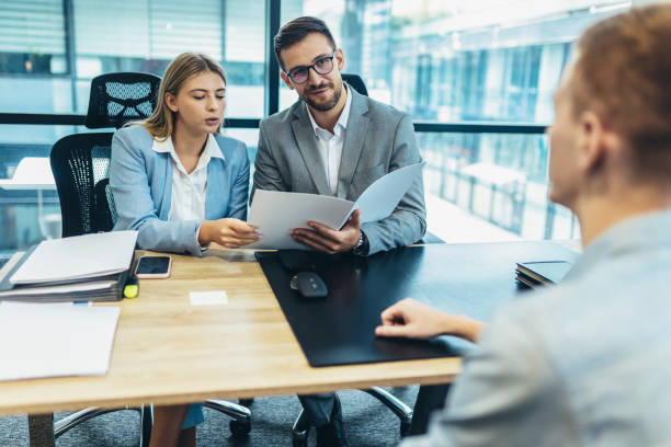 istock Human resource team talking to a candidate during a job interview in the office. 1432791676