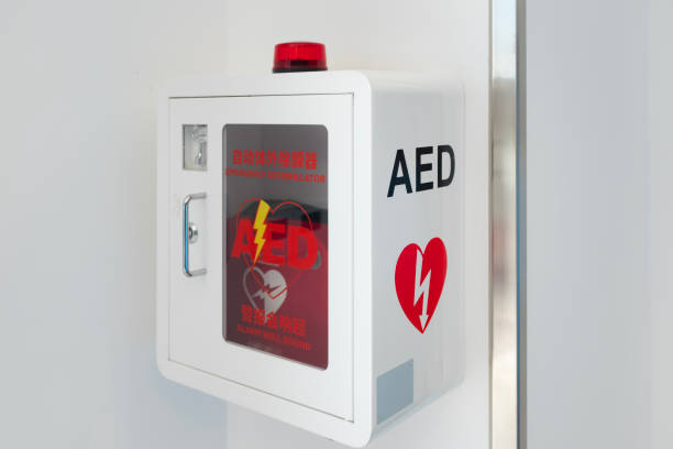 AED first aid equipment arranged in public places AED first aid equipment arranged in public places warning coloration stock pictures, royalty-free photos & images