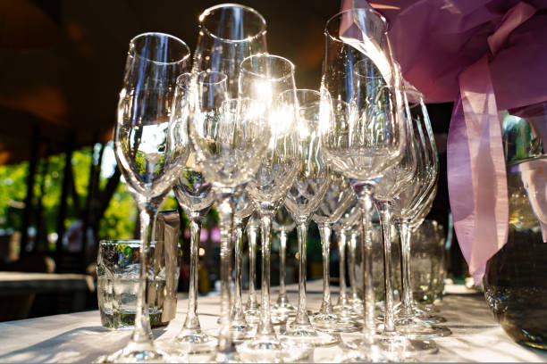 istock empty wine glasses on an open-air table. the sun's rays in the glass. 1432792158