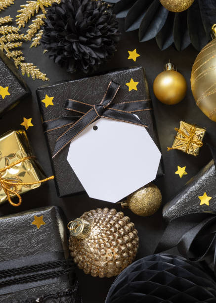 istock Black and golden Christmas Gift Boxes and ornaments, square gift tag Mockup 1432795358