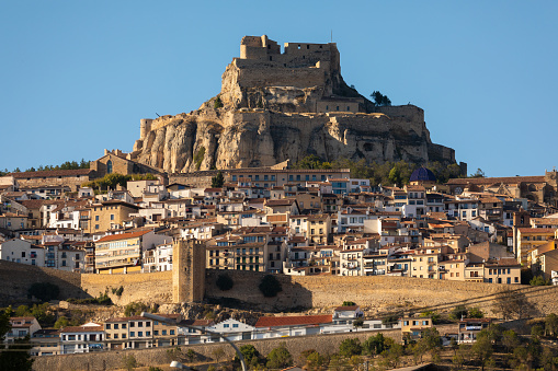 View of the town of Morella, its houses and castle, an ancient, landmark, walled town located on top of a hill in the province of Castellón, Valencian Community, Spain