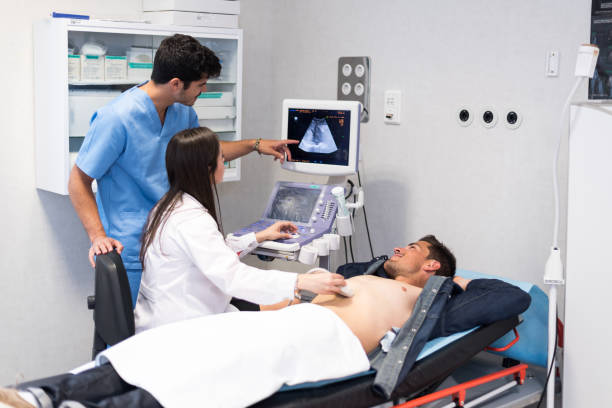 istock Doctor examining patient with ultrasound scan 1432802423