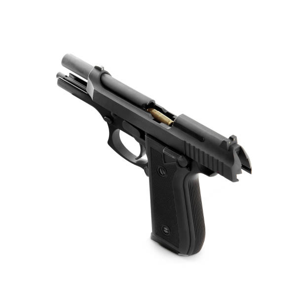 istock Handgun with loaded bullet 1432803137
