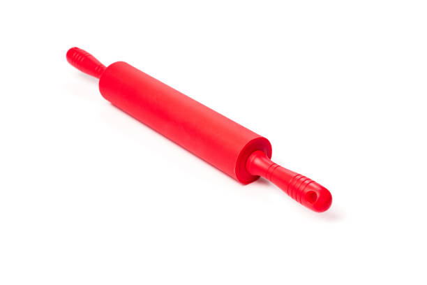 istock red rolling pin with silicone coating for rolling dough on a white background. 1432805531
