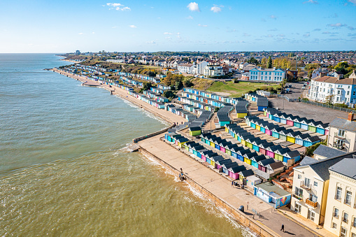 Beautiful panoramic of Zeebrugge beach with sand dunes and hotel buildings on a scenic sunny day with blue sky, Flanders, Belgium