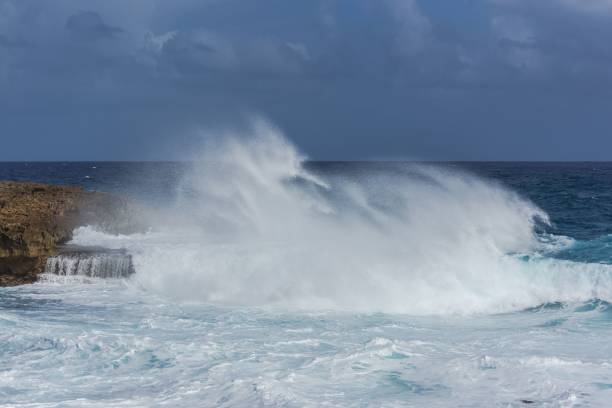 istock Big waves hitting the rocks on the island 1432806832