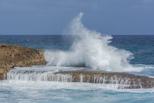 istock Big waves hitting the rocks on the island 1432806834