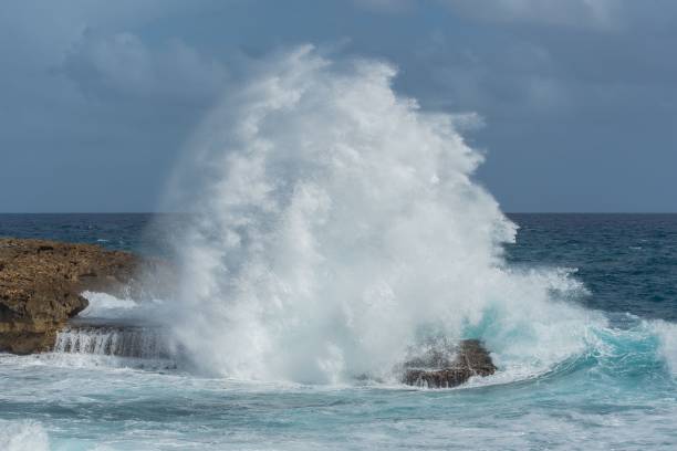 istock Big waves hitting the rocks on the island 1432806838
