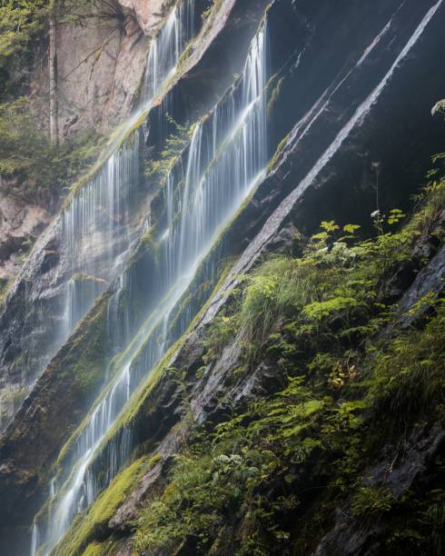 istock A beautiful waterfall in a green nature between mountains 1432807255