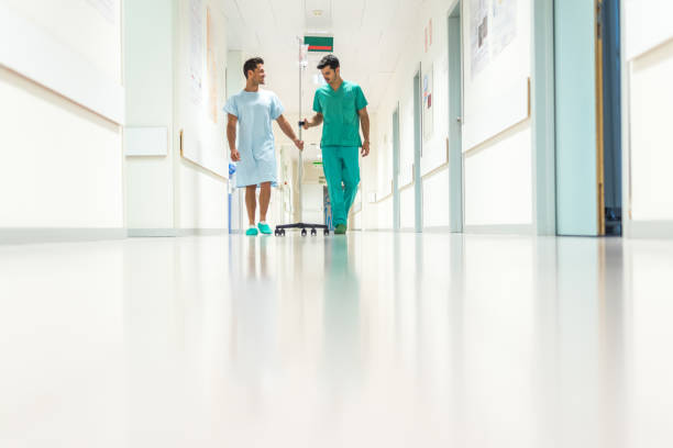 istock Doctor and patient in hall 1432808836