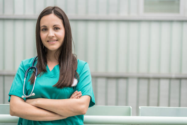 istock Confident medic woman with arms crossed 1432808970