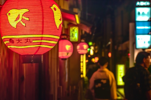 A beautiful shot of a Japanese red lantern on the street