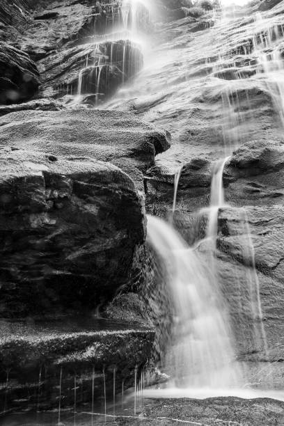 istock Grayscale of rocky waterfall, long exposure 1432810636