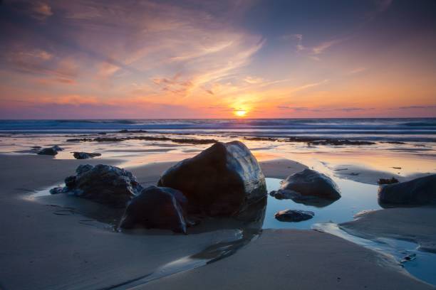 istock Beautiful view of rocky coast at sunset 1432810655
