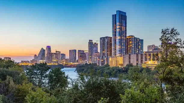 An aerial beautiful view of Austin City with skyscrapers during the sunset