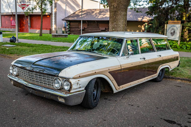 1962 Ford Country Squire Station Wagon Falcon Heights, MN - June 19, 2022: High perspective front corner view of a 1962 Ford Country Squire Station Wagon at a local car show. rusty old wagon detail stock pictures, royalty-free photos & images