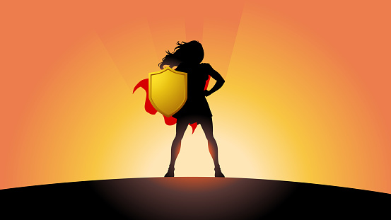 A silhouette style vector illustration of a female superhero standing in power pose. Easy to grab and edit. Wide space available for your copy.