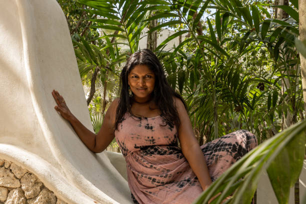 istock Beautiful Indian woman posing in the rainforest 1432814733
