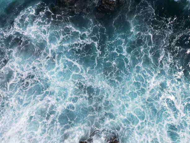 istock High angle shot of flowing waves and ripples on a sea surface 1432816310