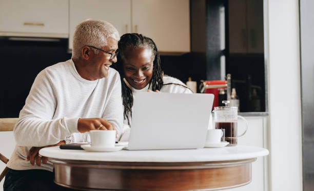 istock Happy senior couple having a video call at home 1432816332