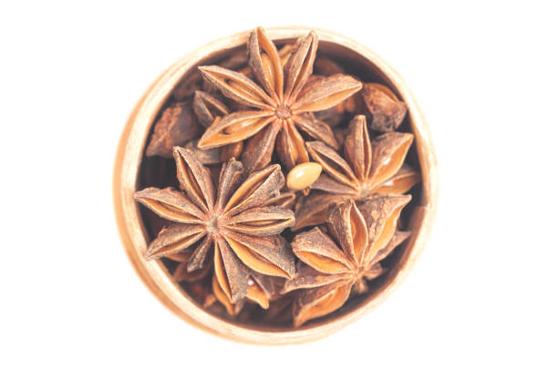 istock Star anises dried spice fruits top view 1432818181