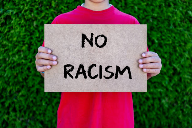 protest against racism boy holding sign with anti-racism slogan i cant breathe photos stock pictures, royalty-free photos & images