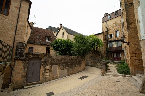 Santiago de Compostela, Spain - Jun 18, 2023: The narrow, cobbled Hortas Street, Rua das Hortas is the first stage of Camino Finisterre at Santiago de Compostela, Galicia, Spain