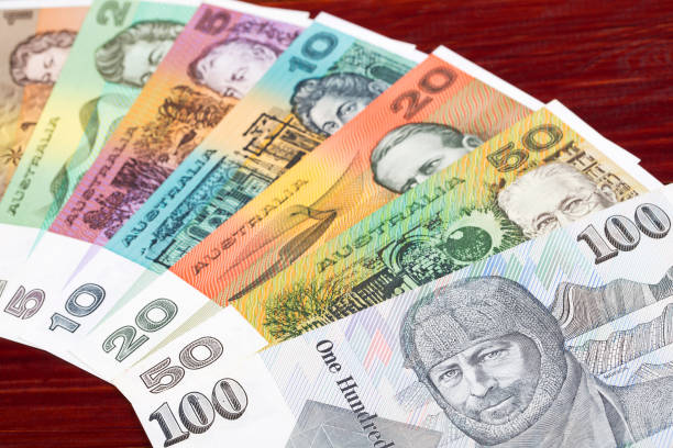 istock Old banknotes from Australia a background 1432822027