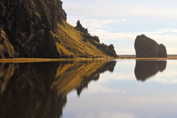 istock Reflection of mountain cliff in Iceland 1432823287