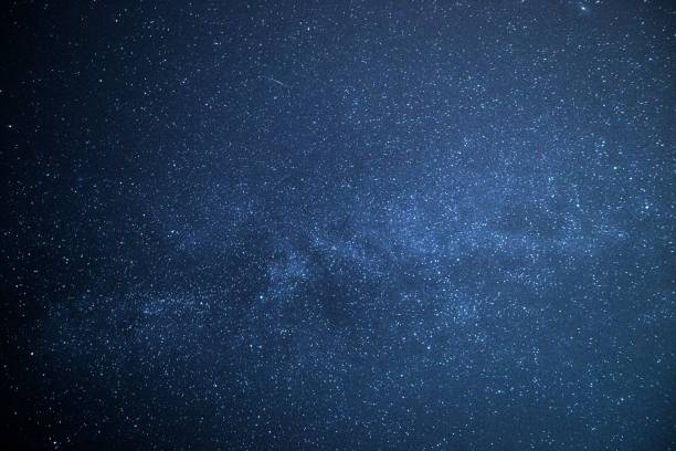 istock Beautiful view of a blue starry sky 1432823673